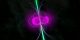 The pulsar's radio beams (green) never intersect Earth, but its pulsed gamma rays (magenta) do.