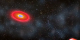 This animation shows the destruction of a red giant by a black hole.  As the gas that makes up the star accelerates and crosses the event horizon, vast plumes of relativistic particles and radiation are emitted from the black hole's poles.