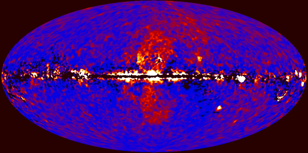 Data from the Fermi Large Area Telescope (LAT) unveil the new feature after several processing steps, illustrated here. First, the data are smoothed to eliminate features smaller than 2 degrees across, then the contrast is increased (stretched). Even without additional processing, the edge of the southern bubble can be seen. Next, astronomers mask out bright point sources, such as pulsars and distant galaxies. Then, using models developed from Fermi LAT observations, astronomers remove the diffuse gamma-ray emission from the image. This reveals the entire new structure, which is further brightened by another contrast stretch.Please credit: NASA/GSFC/DOE/Fermi LAT/D. Finkbeiner et al.
