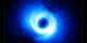 Two spiral arms emerge from the gas-rich disk around SAO 206462, a young star in the constellation Lupus. This image, acquired by the Subaru Telescope and its HiCIAO instrument, is the first to show spiral arms in a circumstellar disk. The disk itself is some 14 billion miles across, or about twice the size of Pluto's orbit in our own solar system. No Labels.   Credit: NAOJ/Subaru