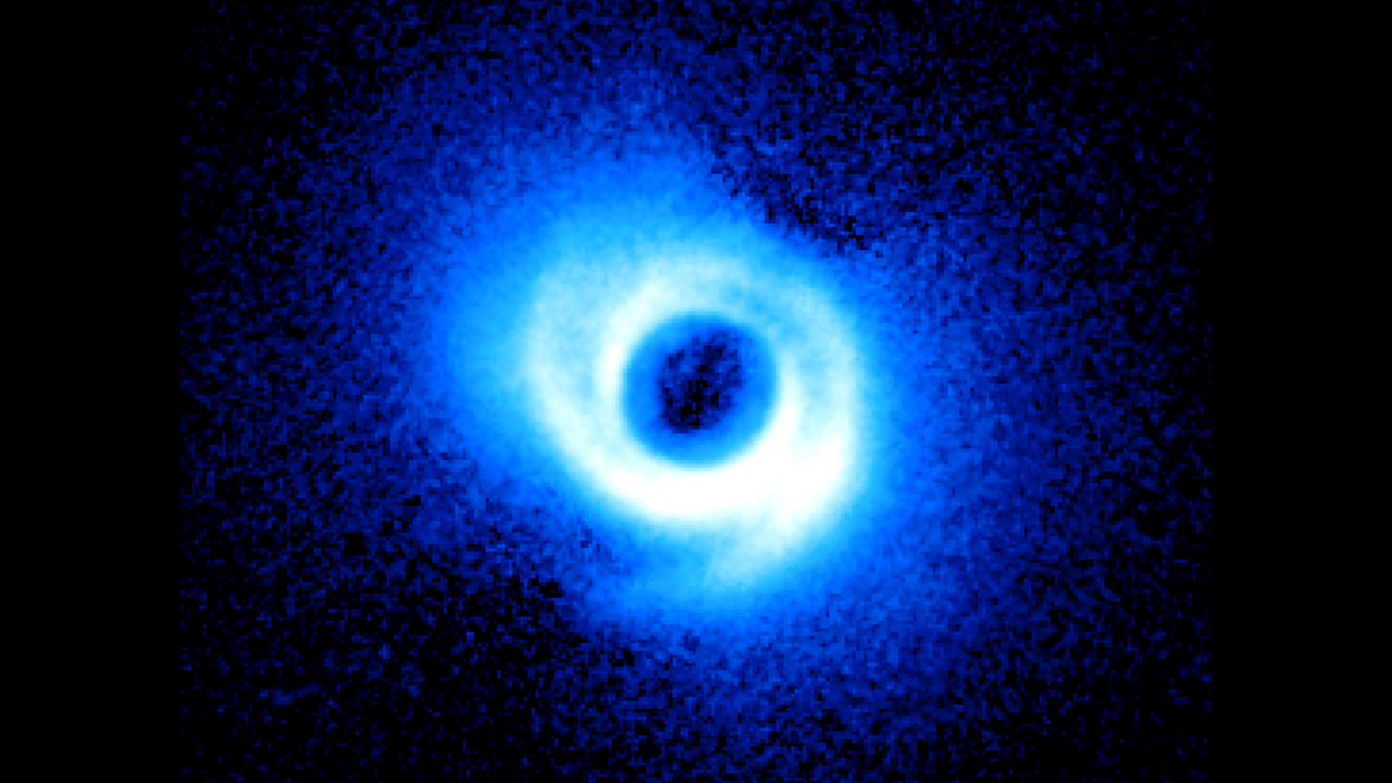 What created the unusual spiral arms surrounding this star?