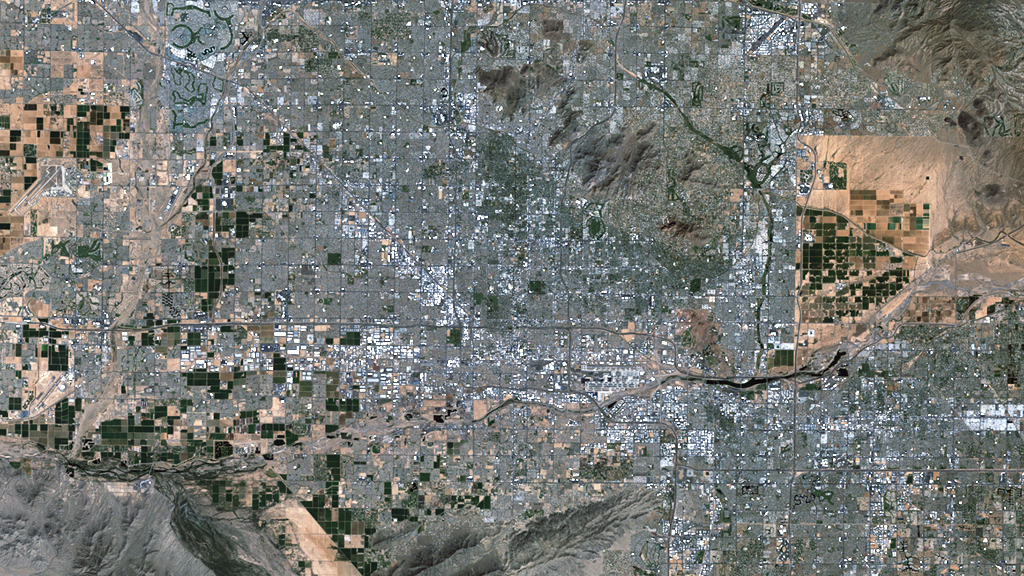 The desert city of Phoenix, Arizona, swaps farms for streets as its population soars.