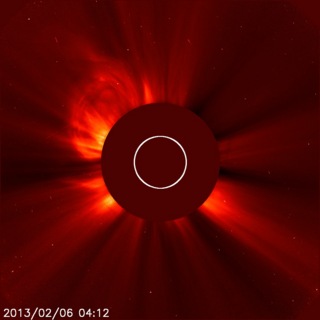 The second of two CMEs from the evening of Feb. 5, 2013, can be seen bursting away from the sun in the upper left hand side of this image, which was captured by the joint ESA/NASA mission the Solar Heliospheric Observatory (SOHO) at 11:12 p.m. EST.  The sun itself is obscured in this picture &mdash taken by an instrument called a coronagraph &ampmdash; so that its bright light doesn't drown out the picture of the dimmer surrounding atmosphere, called the corona. 