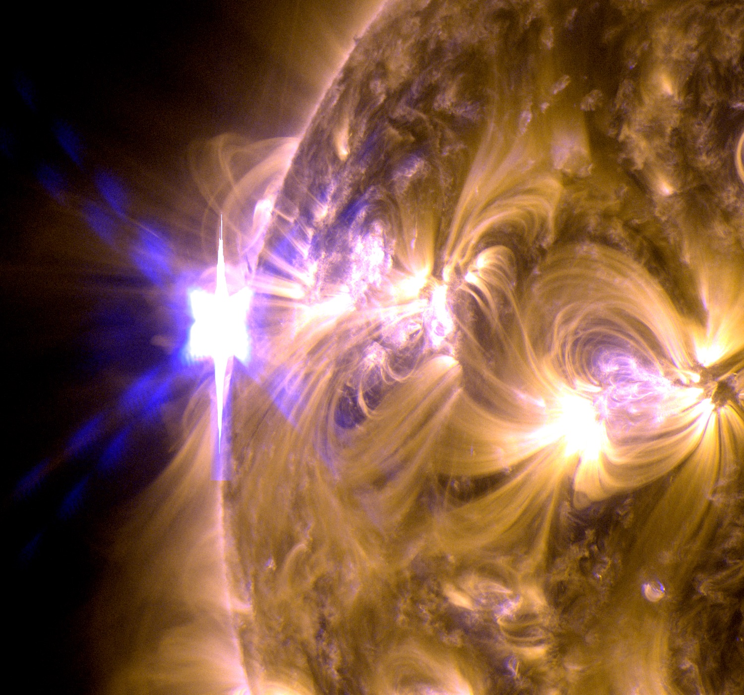 The sun erupted with an X1.7-class solar flare on May 12, 2013.  This is a blend of two images of the flare from NASA's Solar Dynamics Observatory (SDO) — one image shows light in the 171 angstrom wavelength, the other in 131 angstroms.Credit: NASA/SDO/AIA