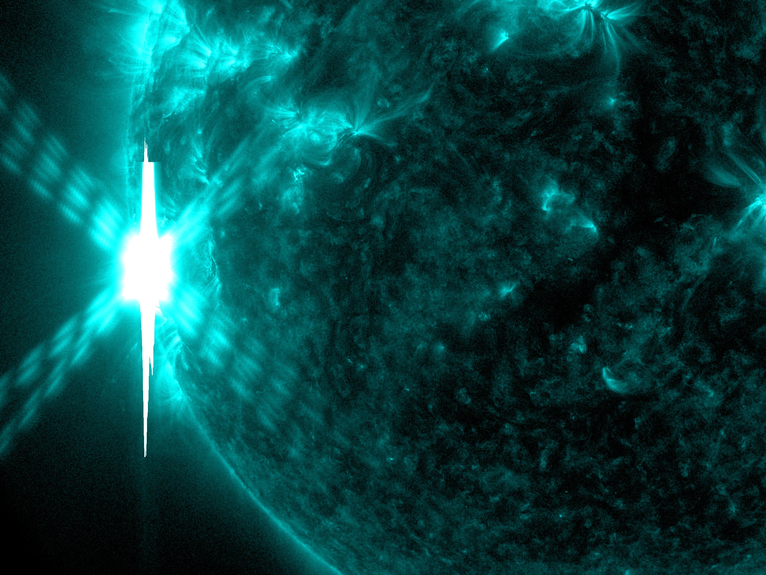 X 4.9 flare captured at 8:00 p.m. EST in 131 angstrom light.  Cropped.Credit: NASA/SDO