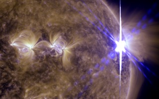 The August 9th, 2011 X6.9 flare as seen by the Solar Dynamics Observatory (SDO) at 8:05UT in a blend of 171 and 131 angstrom light. Cropped.Credit: NASA/GSFC/SDO
