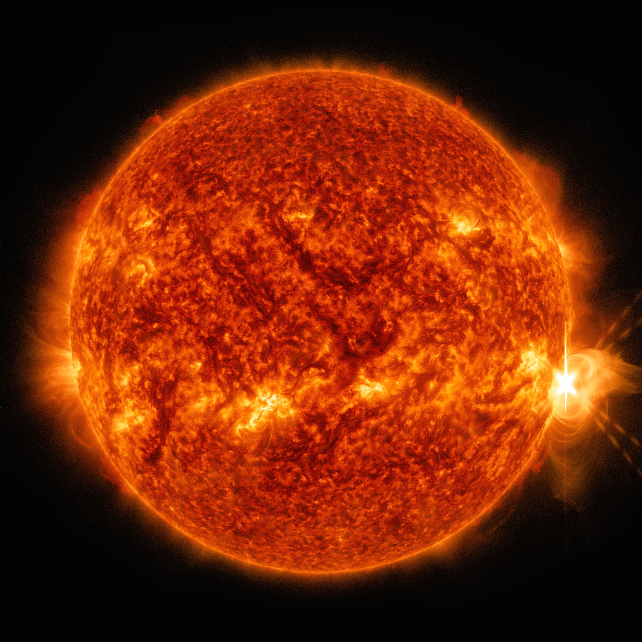 An X 1.4 solar flare erupted on the right side of the sun on the evening of April. 24, 2014. This composite image, captured at 8:42 p.m. EST, shows the sun in ultraviolet light with wavelength of both 131 and 304 angstroms.