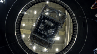 Engineers move the heart of the Webb Telescope holding all four science instruments out of the clean room at NASA's Goddard Space Flight Center and into the huge Space Environment Simulator for several months of testing at temperatures reaching 20 Kelvin or -425 Fahrenheit.