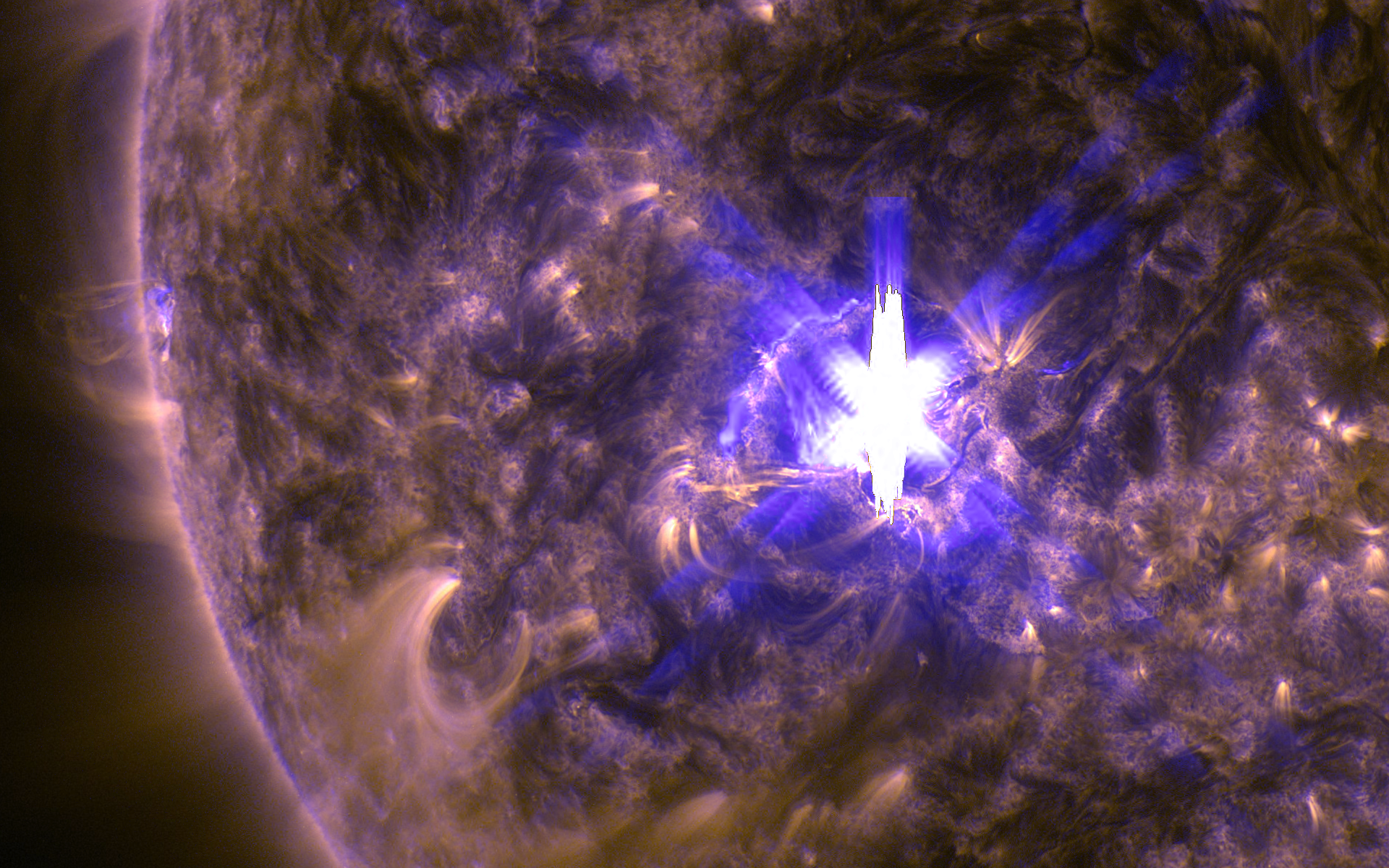 An X2.2 class solar flare flashes in the middle of the sun on Mar. 11, 2015. This image was captured by NASA's Solar Dynamics Observatory and shows a blend of light from the 171 and 131 angstrom wavelengths.Credit: NASA/GSFC/SDO
