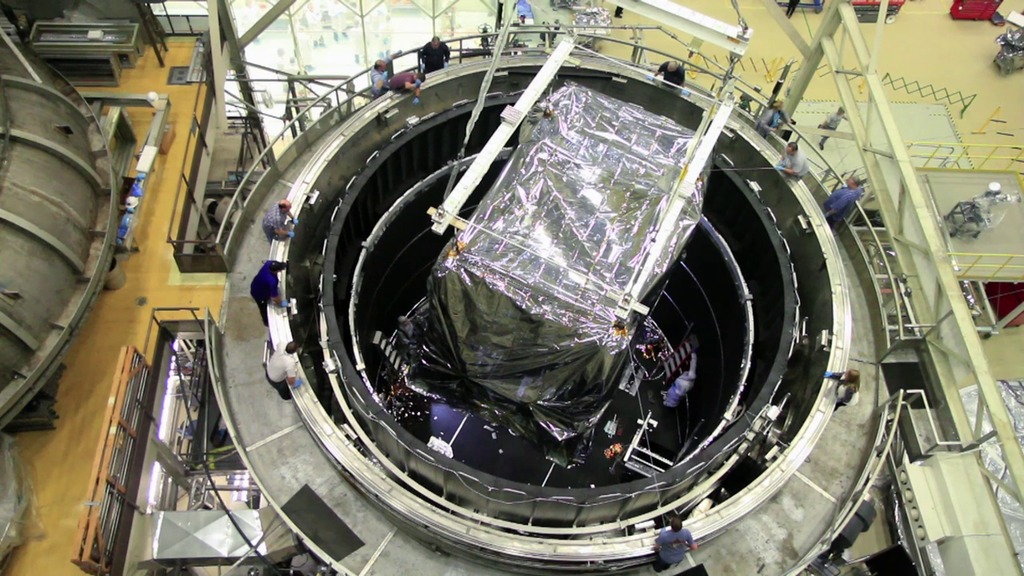 Produced video showing engineers placing the Webb Telescope's Integrated Science Instrument Module (ISIM) with all four Webb telescope instruments into the Space Environment Simulator for its last cryogenic test before being integraed into the telescope.  (10-14-2015)