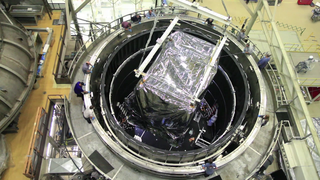 B-roll footage of engineers lifting the Webb Telescope's ISIM into the Space Environment Simulator at NASA Goddard Space Flight Center for it's last cryogenic test before integration into the telescope.