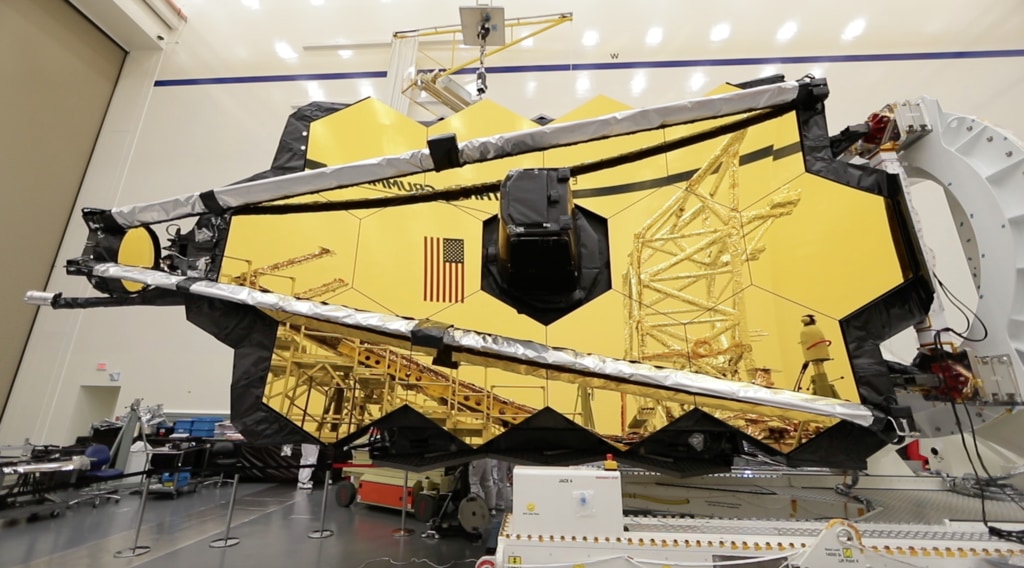 Slow motion B-Roll footage of engineers in Northrop Grumman's cleanroom in Redondo Beach California working on the James Webb Space Telescope's spacecraft element and optical telescope element.  