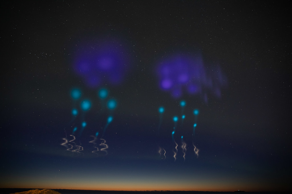 AZURE MissionColorful clouds formed by the release of vapors from the two AZURE rockets allow scientist to measure auroral winds.Credit: NASA/Lee Wingfield