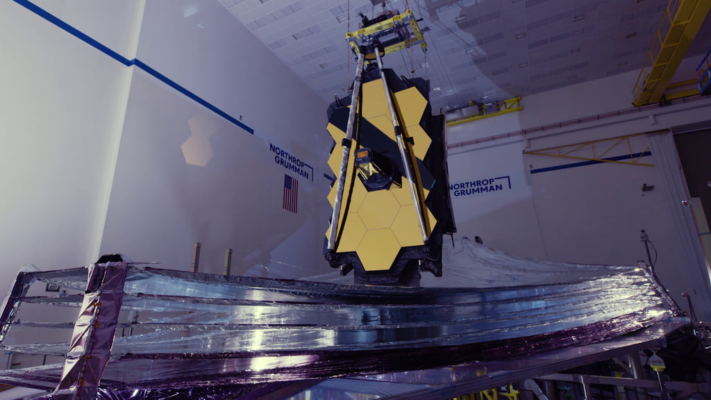 Various beauty shots of the Webb Telescope with its sunshield fully tensioned.  