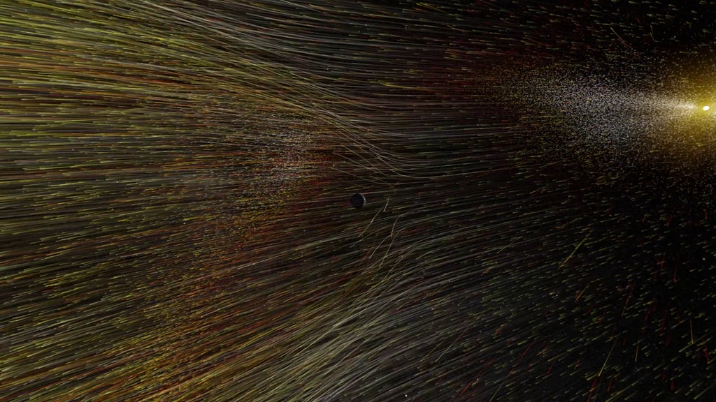 In this animation of the solar wind, particles stream from the Sun towards Earth. Solar radiation ionizes the upper atmosphere, creating a sea of charged particles: the ionosphere. Credit: NASA