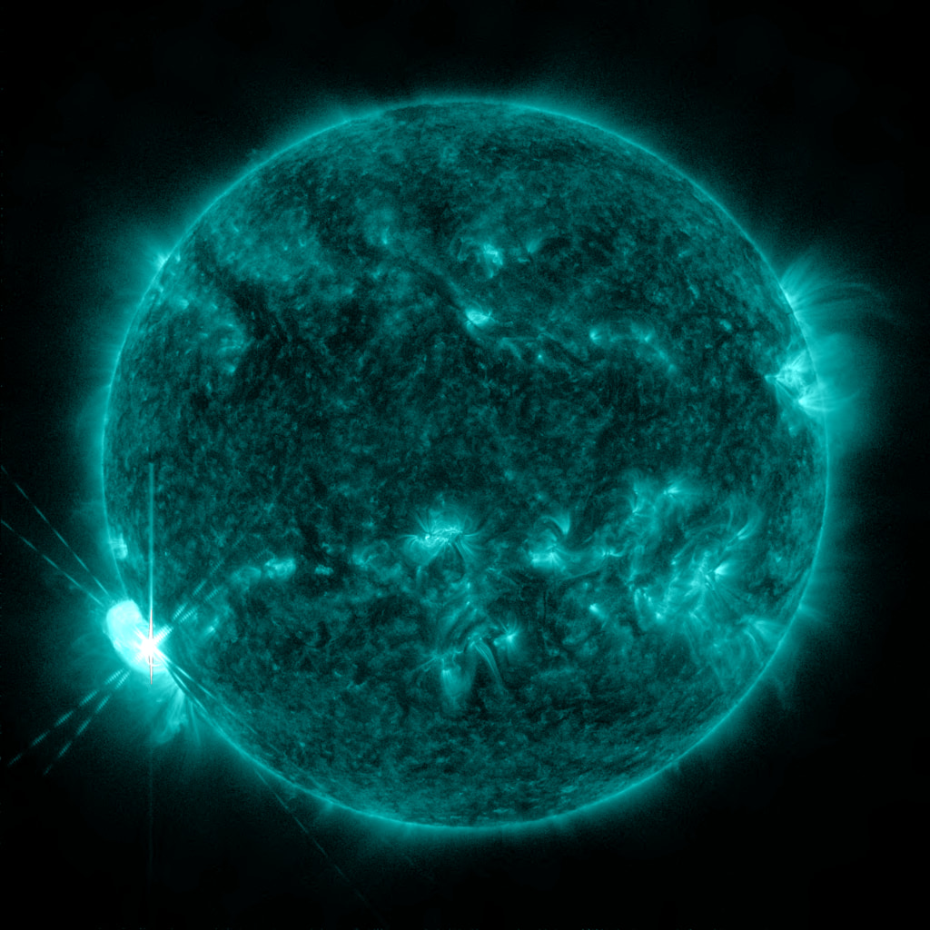 NASA’s Solar Dynamics Observatory captured this image of an X1.1 solar flare – as seen in the bright flash in the upper right portion of the image – on May 3, 2022 at 13:25 UTC. The image is a wavelength of extreme ultraviolet light – 131 angstrom –  that highlights the extremely hot material in flares and which is colorized teal.Credit: NASA/SDO
