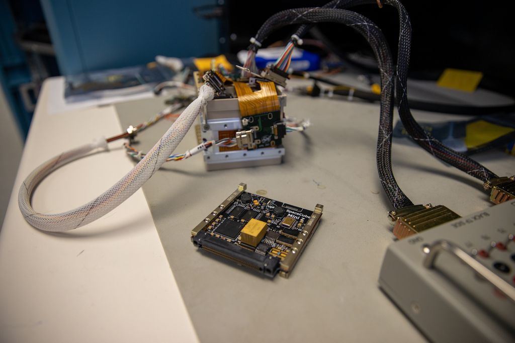 Circuit boards are inserted into a card stack, like the one shown here, before they’re tested and attached to the baseplate of BurstCube’s spacecraft housing.Credit: NASA/Sophia Roberts