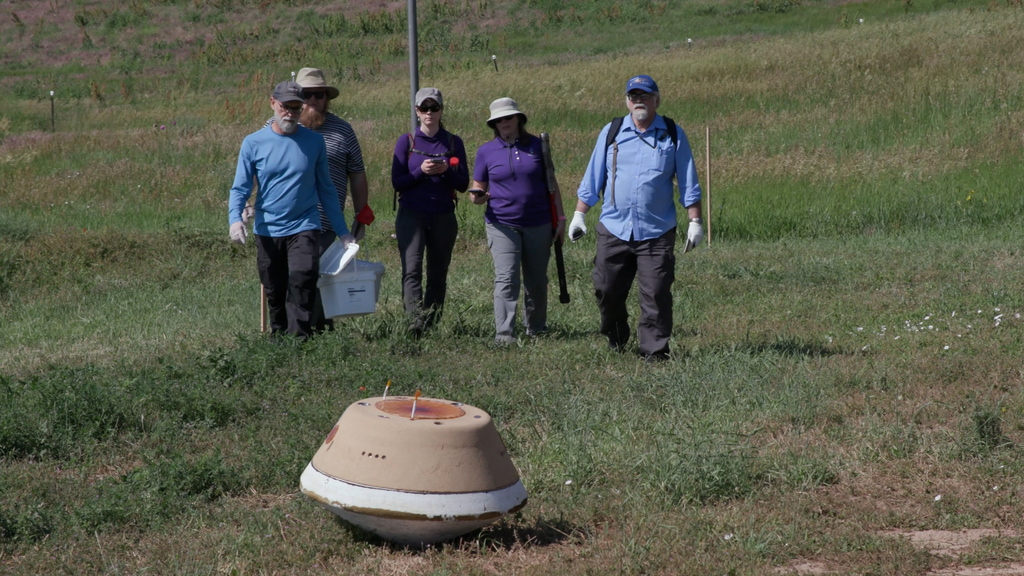 Recovery team members rehearse bagging and moving OSIRIS-REx’s sample return capsule at Lockheed Martin Space in Littleton, Colorado, ahead of the sample’s return to Earth Sept. 24.Credit: Lockheed Martin Space