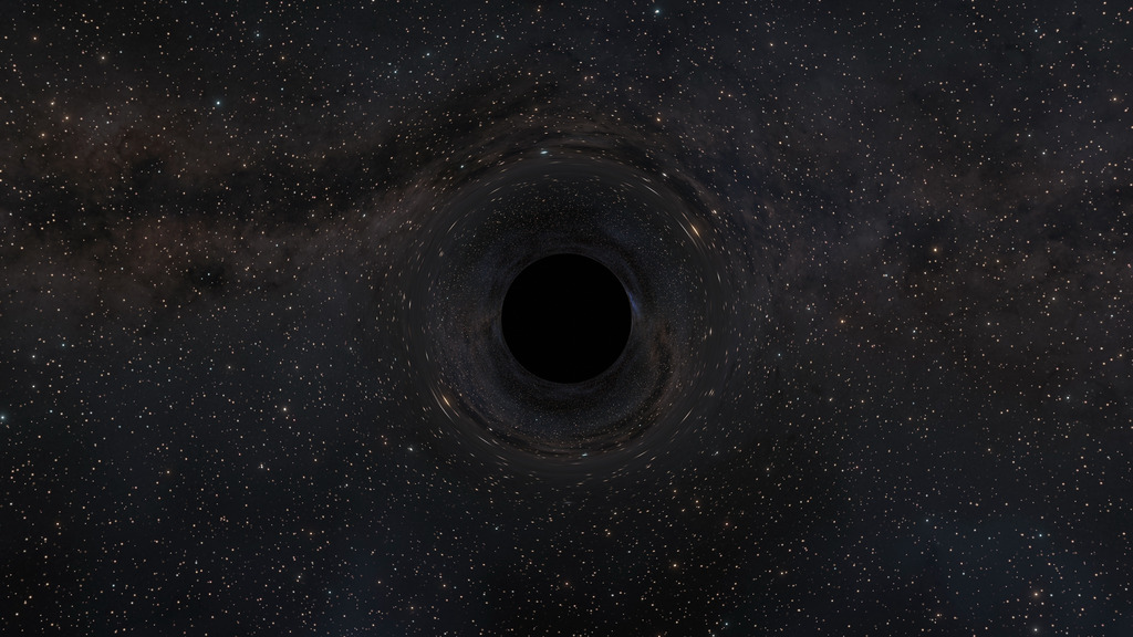 In this video the camera orbits around a bare black hole, getting closer to it over time. The black hole is only seen because of the way light warps around it. Note how an inverted view of the sky appears inside the “Einstein Ring” surrounding the black hole’s shadow. Features that are about to move into the left side of the frame can first be seen slowly moving away from the right side of the black hole’s shadow. 