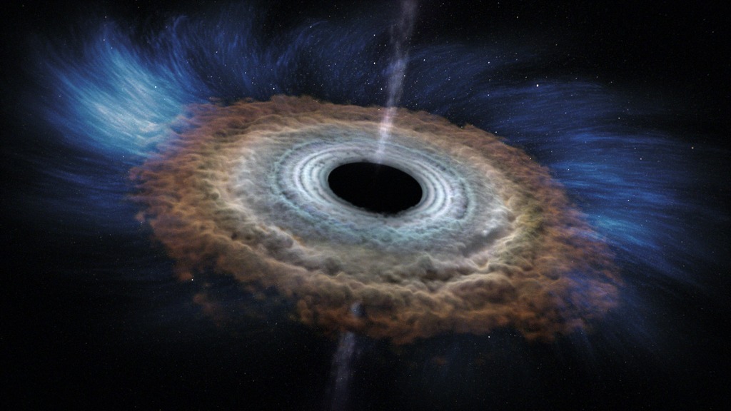 A star approaching too close to a massive black hole is torn apart by tidal forces, as shown in this artist's rendering. Filaments containing much of the star's mass fall toward the black hole. Eventually these gaseous filaments merge into a smooth, hot disc glowing brightly in X-rays. As the disk forms, it's central region heats up tremendously, which drives a flow of material, called a wind, away from the disk.Credit: NASA's Goddard Space Flight Center/CI LabWatch this video on the NASA Goddard YouTube channel.For complete transcript, click here.