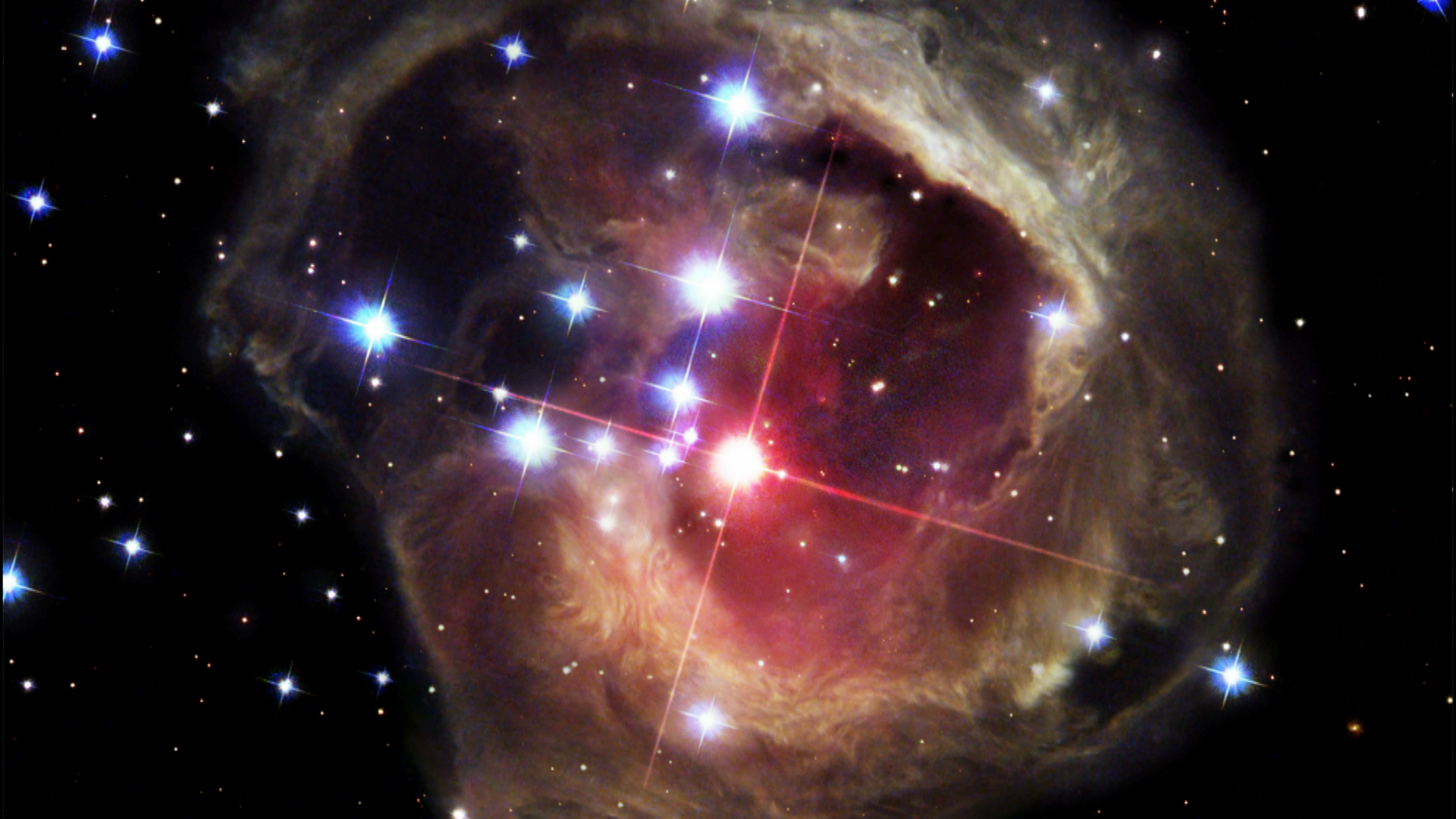 Images from Hubble show light echo surrounding V838 from 2002 to 2006.