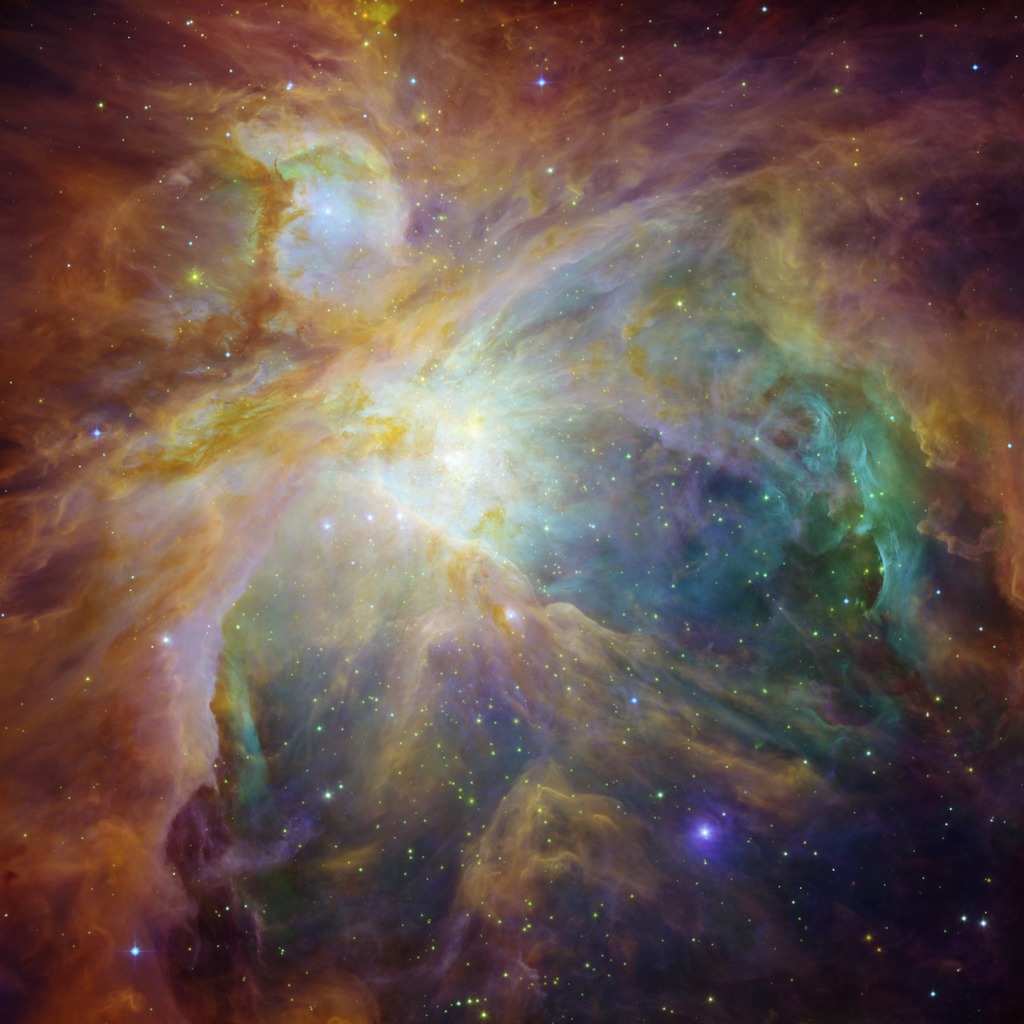 Hubble and Spitzer collaborate to show hundreds of baby stars and strong stellar winds shaping the gas and dust of the Orion Nebula